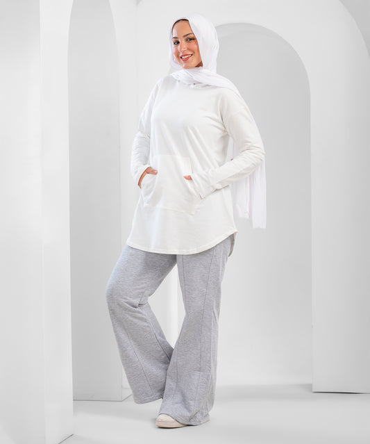 Akira pin tuck flare sweatpants with high waist and relaxed fit, featuring subtle pin tuck details and wide-leg design.