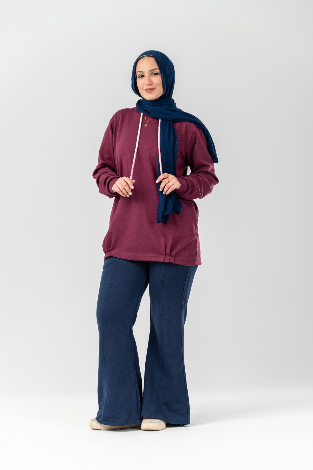Comforty hoodie by Akira featuring a soft, cozy fit with a front pocket and adjustable drawstrings in a casual, stylish design.