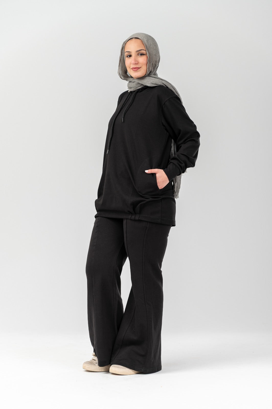 Black Comfort Hoodie by Akira, featuring a relaxed fit and soft fabric, displayed on a mannequin.