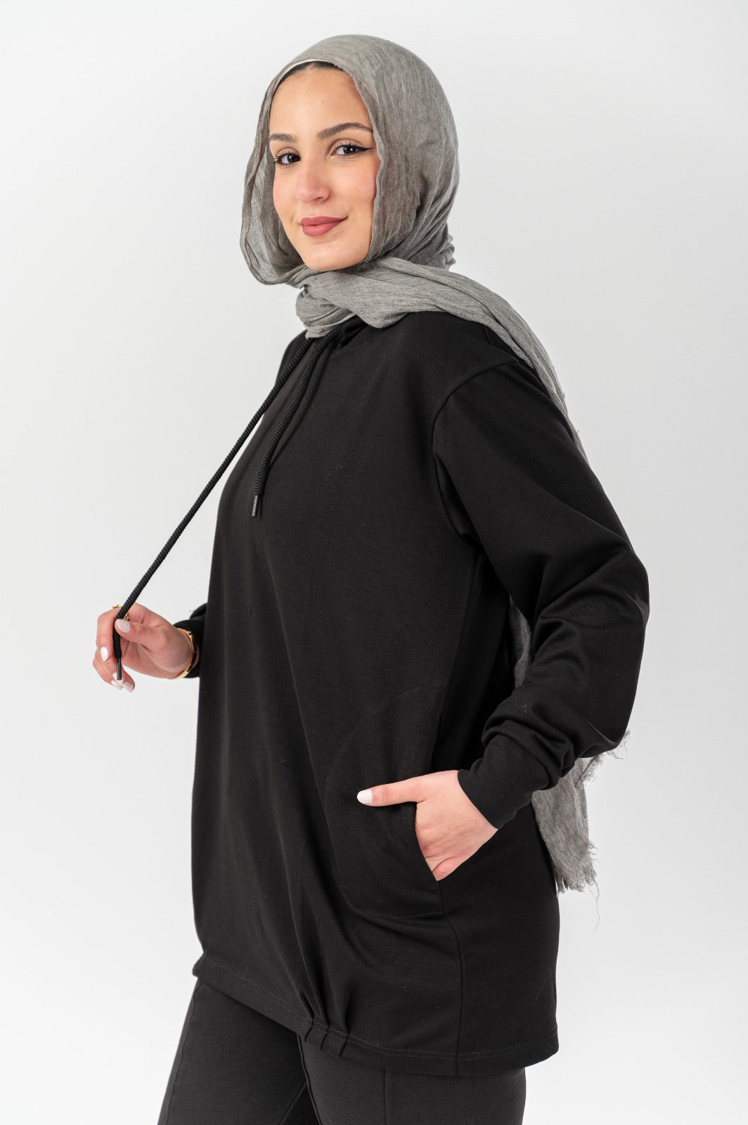 Black Comfort Hoodie by Akira featuring a relaxed fit, soft fabric, and a casual style perfect for everyday wear.