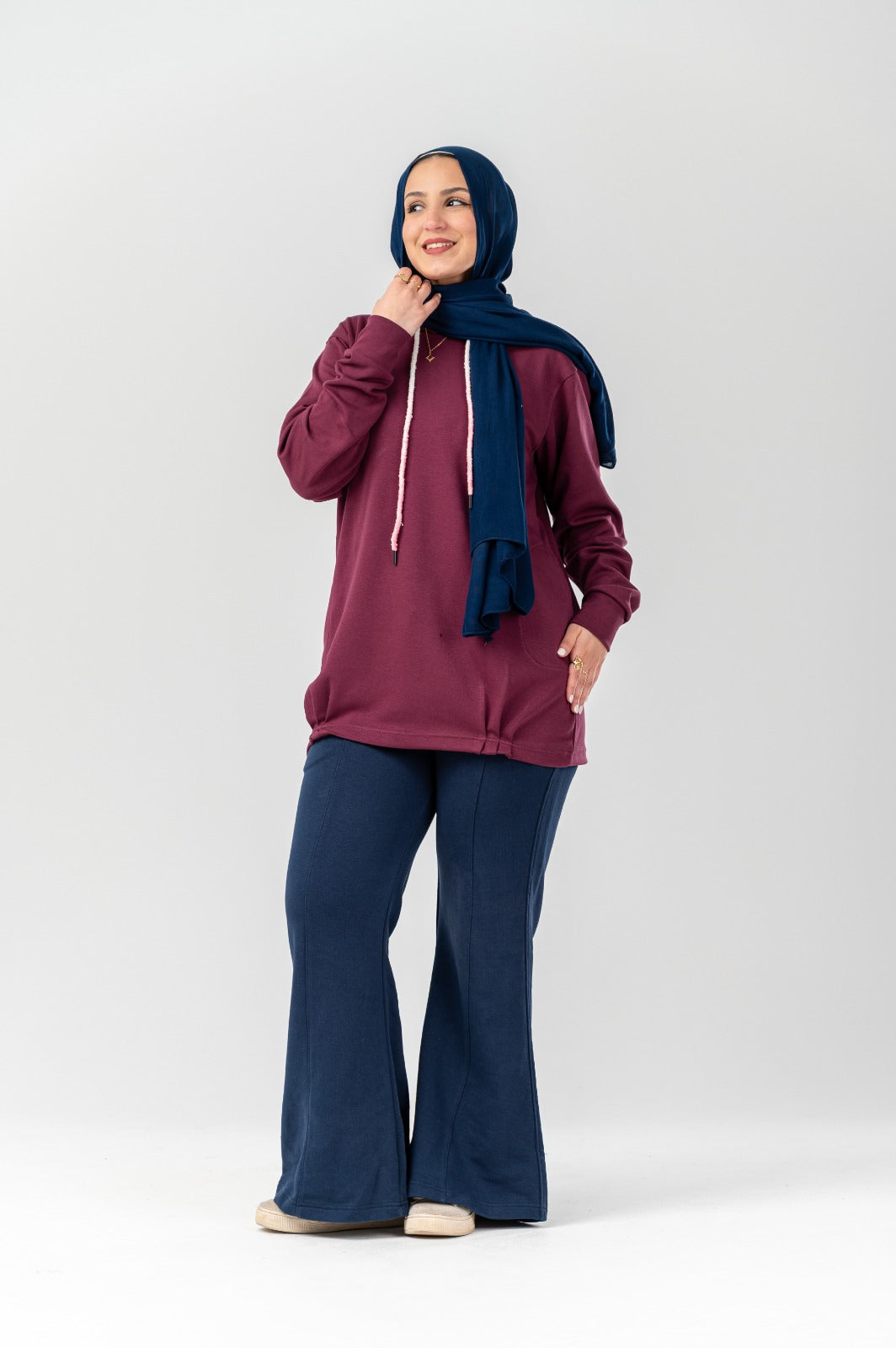 Black Comforty hoodie by Akira featuring a relaxed fit, front kangaroo pocket, and adjustable drawstring hoodie.