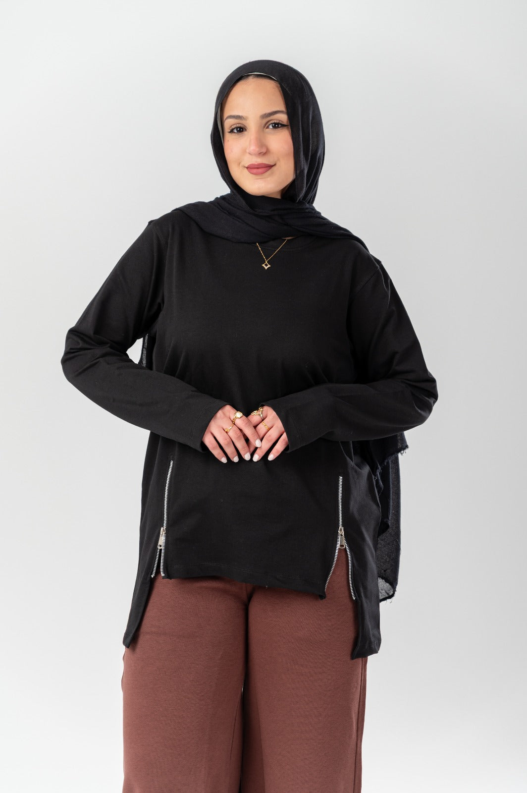 Longline T-shirt with side zipper detail by Akira, featuring a relaxed fit and casual style in the image.