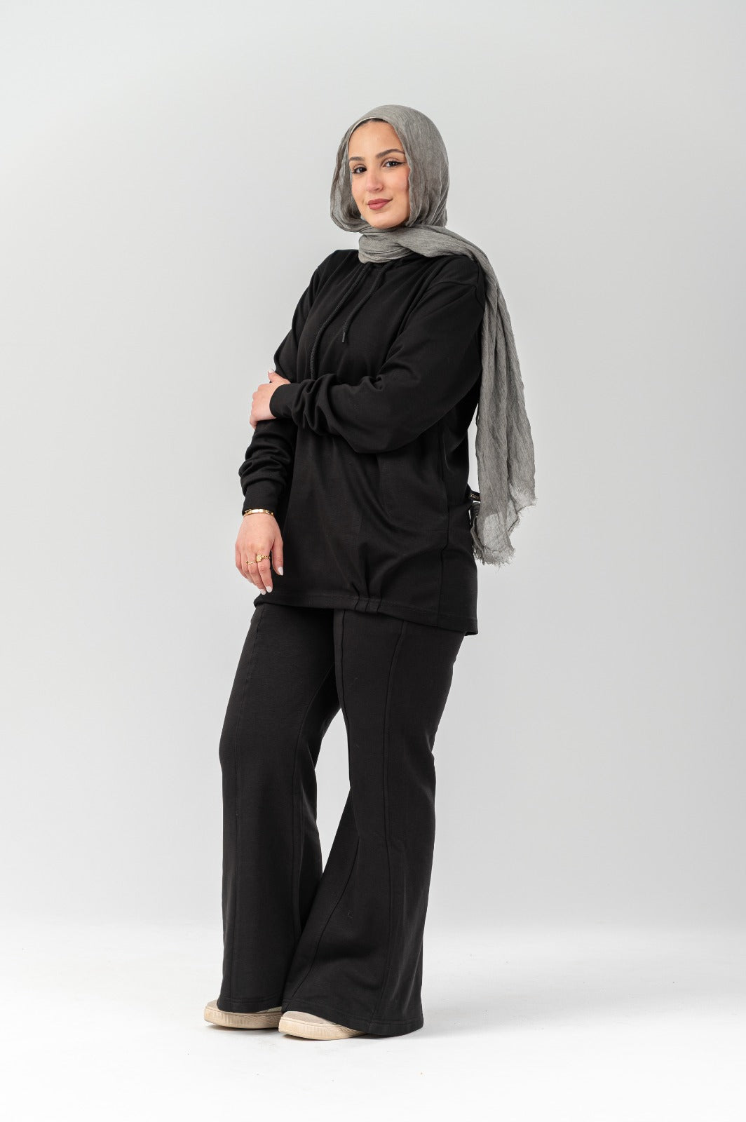 Black Comfort Hoodie from Akira, featuring a relaxed fit and soft fabric, shown on a mannequin with front view.