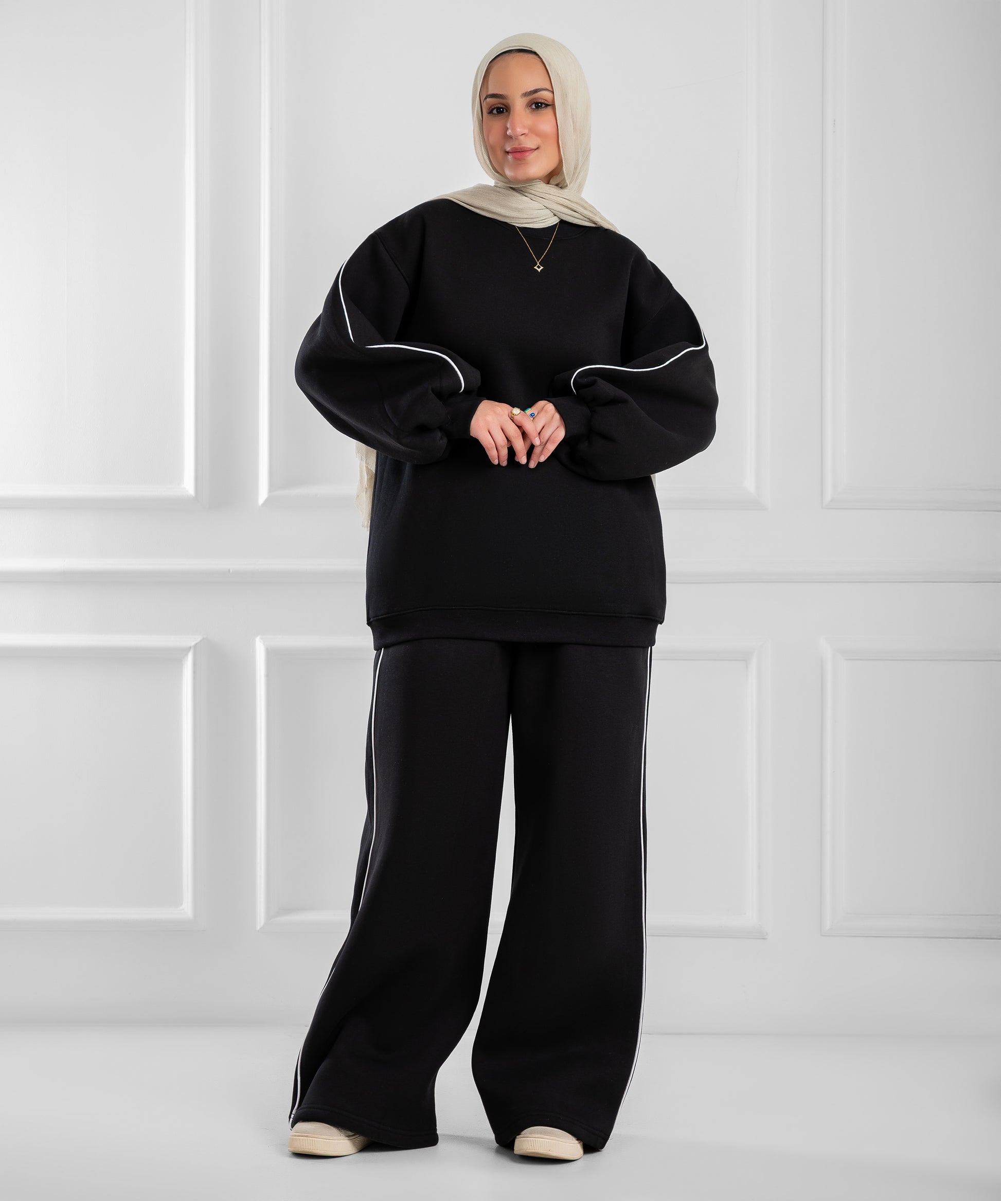 Pink balloon-sleeve lounge set by Akira featuring soft fabric and relaxed fit, perfect for comfortable home wear.