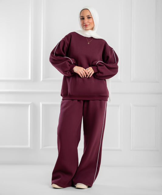 Pink balloon-sleeve lounge set by Akira featuring comfortable, relaxed fit with soft fabric and stylish design.