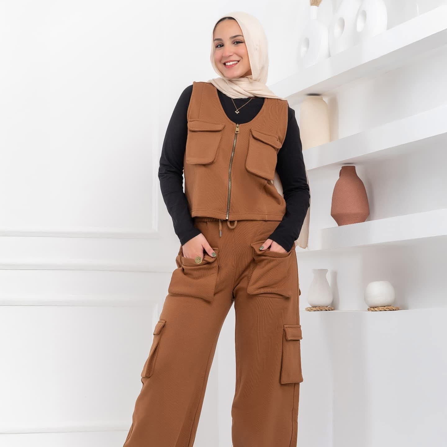 Akira cargo set featuring multiple pockets and adjustable straps, displayed flat with neutral background.