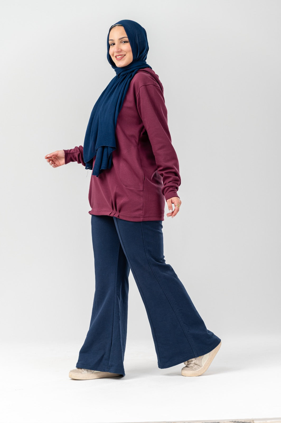 Black Akira Hoodie Comforty with front pocket and drawstring hood, made from soft, cozy fabric for casual wear