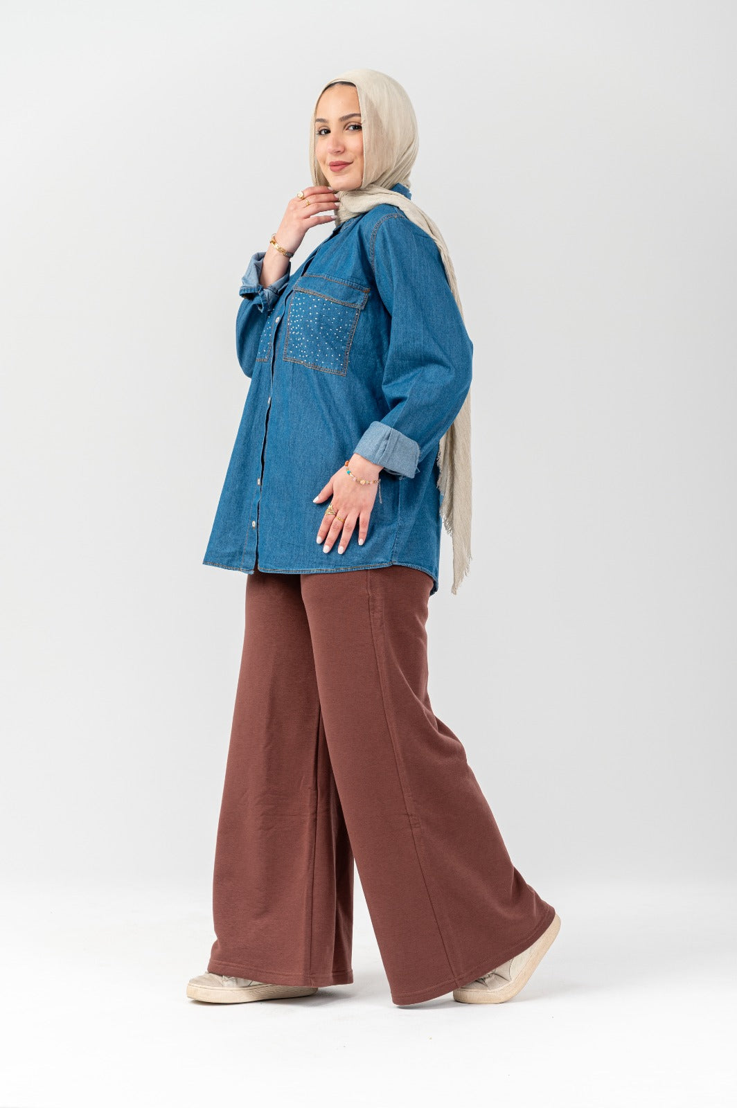 Akira Crystal-Pocket denim shacket featuring crystal-embellished pockets and classic denim fabric, casual outerwear for stylish looks.