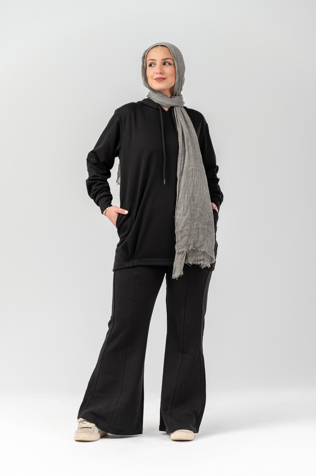 Black Comfort Hoodie by Akira, shown on a model, featuring a relaxed fit, soft fabric, and casual style for everyday wear.